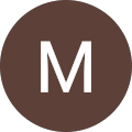 M C